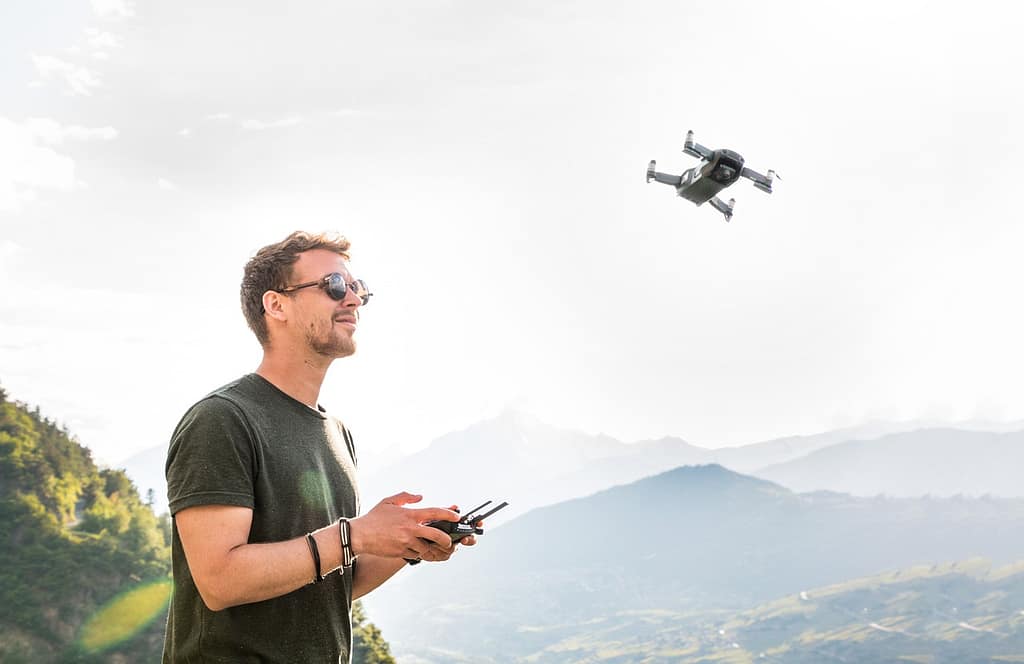 Services drone, man, drone pilot, copter, quadrocopter, remotely controlled, flying camera, flying object, young man, hobby, photographer, aerial photographs, mountains, nature, aerial photography, drone, drone, drone, drone, drone